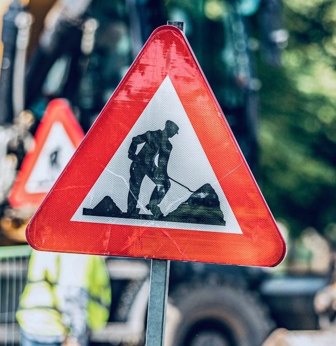 red and black traffic sign